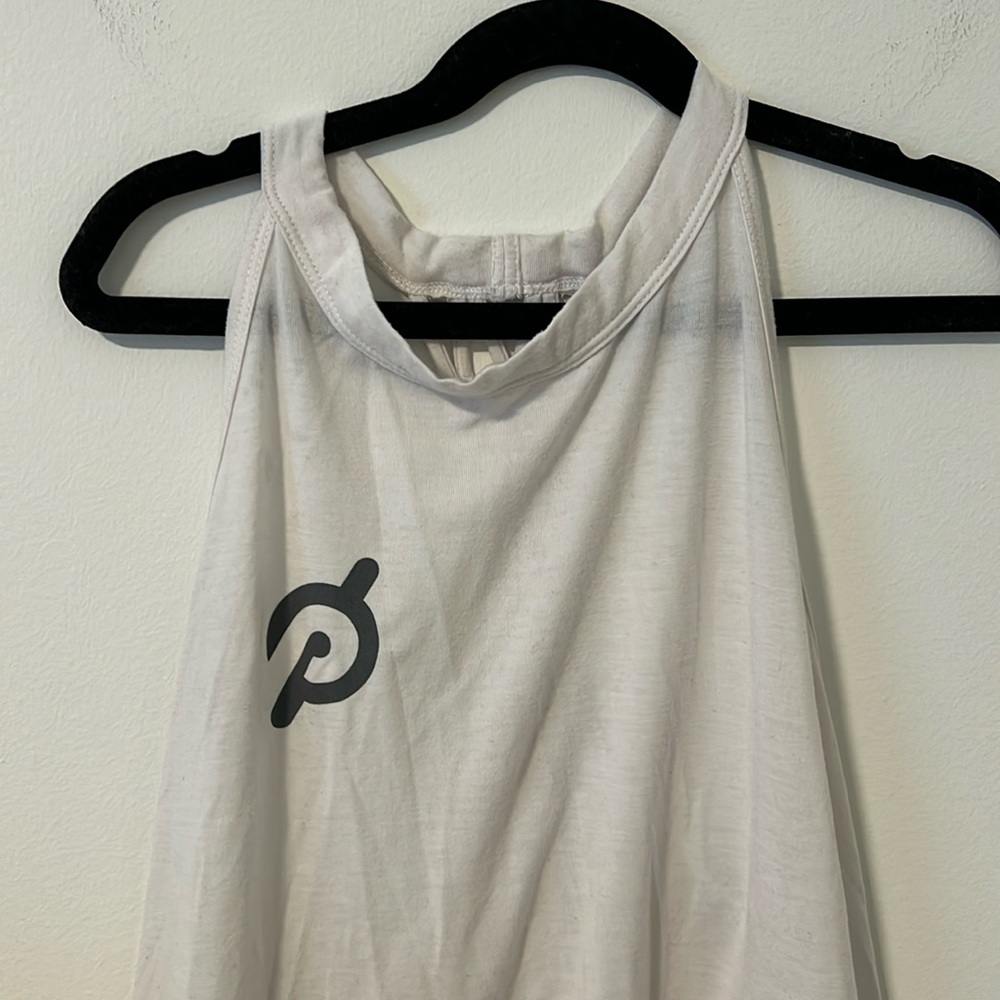 Lightly stained Peloton tank